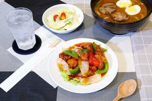 Sweet and sour karaage chicken and gyoza background. Amazu Karaage photo