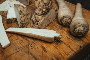 Mix of fresh vegetables on a wooden board, healthy food photo