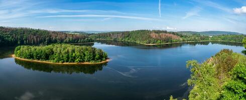 Lake and island with trees. Water reservoir Sec, Czech Republic, Europe photo