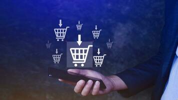 Shopping Online. Using Smartphone shopping online. shopping cart and business icons with virtual, business delivery e-commerce, shopping on internet, offers home delivery. photo