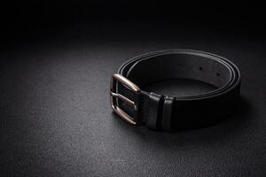 New leather men's belt with an old-style metal buckle photo