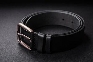 New leather men's belt with an old-style metal buckle photo