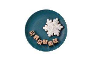 Beautiful Christmas composition with copy space with an inscription in wooden cubes photo