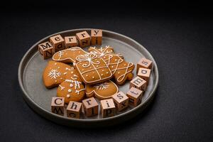 Beautiful Christmas composition with copy space with an inscription in wooden cubes photo