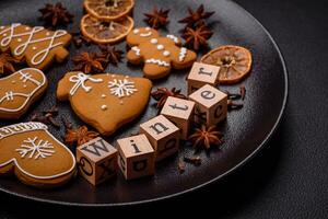 Beautiful Christmas composition with copy space with an inscription in wooden cubes photo