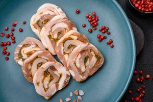 Delicious meatloaf with lard, salt, spices and herbs cut into slices photo