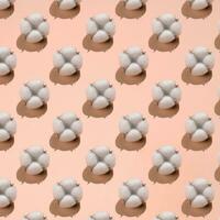 Cotton pattern on a light Peach Fuzz background. photo