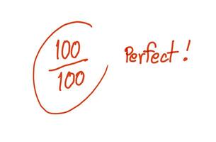 Handwritten with red ink to show exam result with scores 100 from total of 100 Perfect. Concept , educational evaluation Using compliment word to encourage and motivate of learning. photo