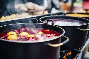 AI generated Beverages fruits and berries hot mulled wine in pots with steam in street food market. Generative AI photo