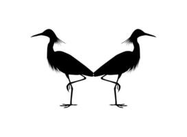 Pair of The Black Heron Bird, Egretta Ardesiaca, also known as the Black Egret Silhouette for Art Illustration, Logo, Pictogram, Website, or Graphic Design Element. Vector Illustration