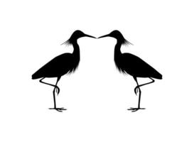 Pair of The Black Heron Bird, Egretta Ardesiaca, also known as the Black Egret Silhouette for Art Illustration, Logo, Pictogram, Website, or Graphic Design Element. Vector Illustration