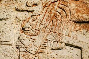 ancient carvings on the wall photo