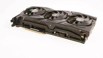 big black contemporary gaming graphics card on white background loopable spinning closeup view video