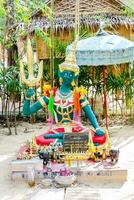 a colorful statue of a god photo