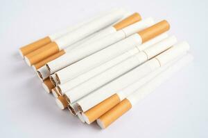 Cigarette, tobacco in roll paper with filter tube, No smoking concept. photo