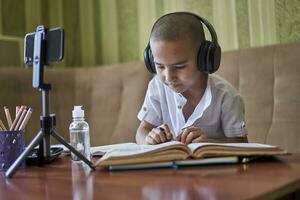 Child studying a lesson photo