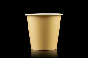 AI generated Side view yellow empty disposable paper fast food cup isolated on black background. Generative AI photo