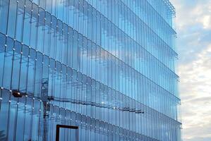 Fragment of glass and metal facade walls. Commercial office buildings. Abstract modern business architecture. photo