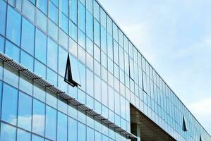 Fragment of glass and metal facade walls. Commercial office buildings. Abstract modern business architecture. photo