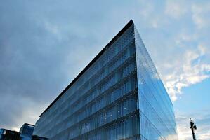 Fragment of glass and metal facade walls. Commercial office buildings. Abstract modern business architecture. photo