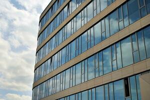 Fragment of glass and metal facade walls. Commercial office buildings. Abstract modern business architecture. photo