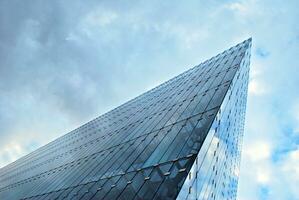 Fragment of glass and metal facade walls. Commercial office buildings. Abstract modern business architecture. photo