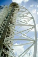 the top of a tall building with a large white structure photo