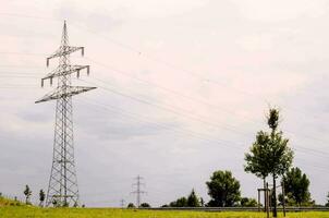 electricity pylons in the countryside photo