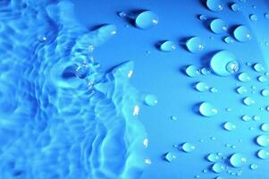 water droplets on a blue background photo