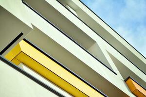 Modern apartment building in sunny day. Exterior, residential house facade. photo