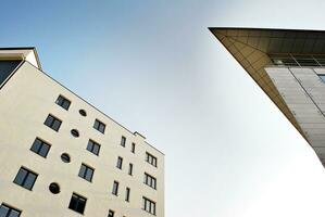 Modern apartment building in sunny day. Exterior, residential house facade. photo