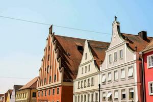 colorful buildings line the streets of a european city photo