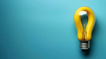 AI generated Yellow light bulb on blue background with copy space. photo