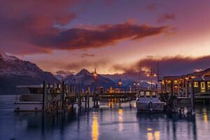 beautiful sunset sky at queenstown port one of most popular traveling destination in  southland new zeland photo