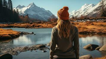 AI generated Female hiker in winter hat enjoying calm lake view. Generative AI photo