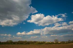 blue sky background with white striped clouds in heaven and infinity may use for sky replacement photo