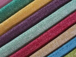 Colorful background, A stack of colorful fabric. Full frame shot of muti colored fabric background photo