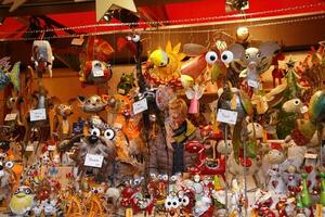 Puppets and animal toys in the Christmas market photo