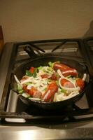 Kielbasi, onions and peppers photo