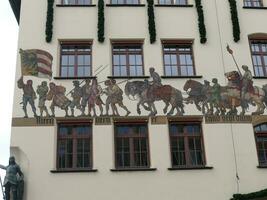 fresco of medieval merchant convoy of wagons and knights Nuremberg photo