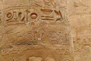 Hieroglyphics on massive columns of Karnak photo