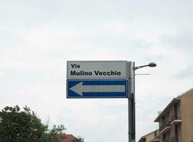 via mulino vecchio transl. old mill road sign photo