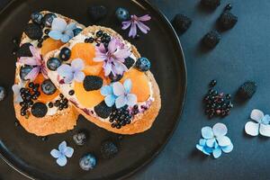 Bruschetta with fruit and cream cheese photo