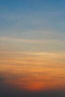 Orange and blue sunset sky gradient, copy space background. Red evening sky. photo