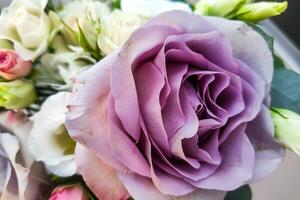 Bouquet of flowers with roses and eustoma photo