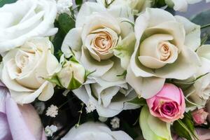 Bouquet of flowers with roses and eustoma photo