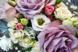 Bouquet of flowers with roses and eustoma photo