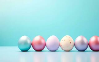 AI generated Row of colorful easter eggs over light blue background with space for text. Set of easter eggs photo for poster, card o greetings.