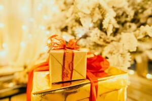 presents under Christmas tree, festive and celebratory atmosphere. photo