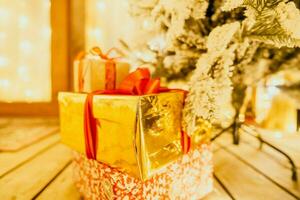 presents under Christmas tree, festive and celebratory atmosphere. photo